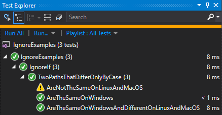 image of Visual Studio Test Explorer pain with two tests, one named &ldquo;AreTheSameOnWindows&rdquo; with the passed icon next to it, and one named &ldquo;AreNotTheSameOnLinuxAndMacOS&rdquo; with the skipped icon next to it